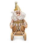 Santa Navideño Decorativo Beige y Dorado en Trineo 24 x 11 cm